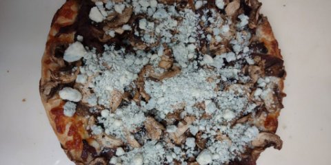 blu moo pizza:<br />
This pizza is topped with garlic olive oil sauce, mozzarella cheese, steak strips, mushrooms, and amablu cheese. It pairs well with our BARN BLUFF BROWN ALE